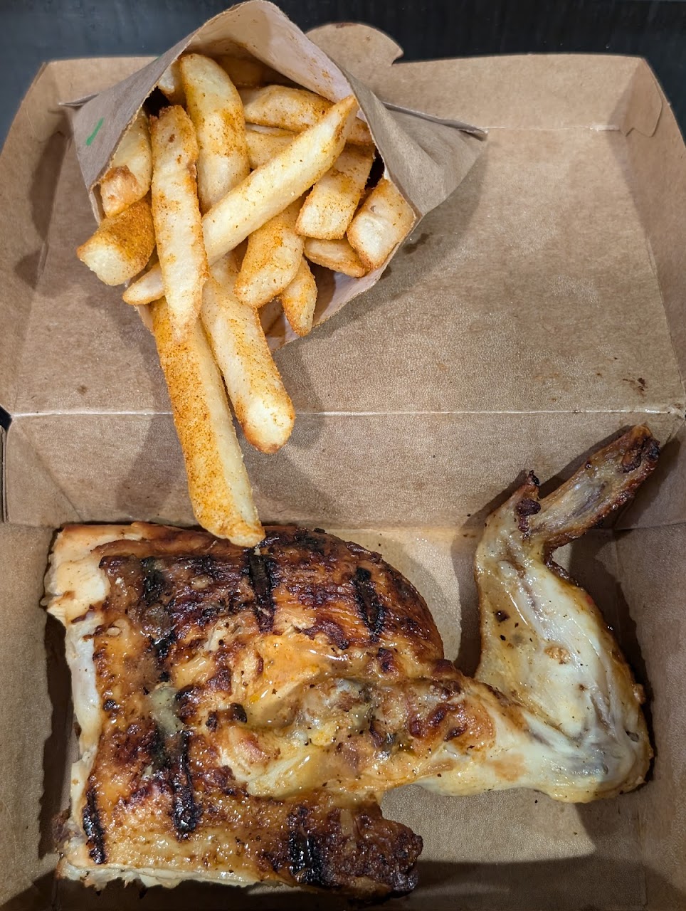 Flame-grilled PERi-PERi chicken with chips at Nando's Toowong